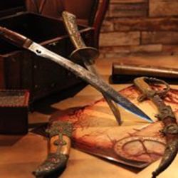 Quest World לוגו