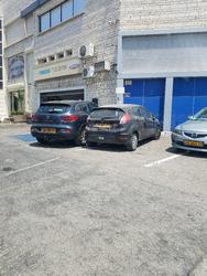 מרכז שירות אחים נג'אר לוגו